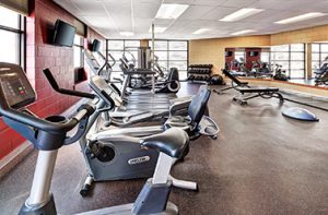 Gym and fitness facility at hotel.